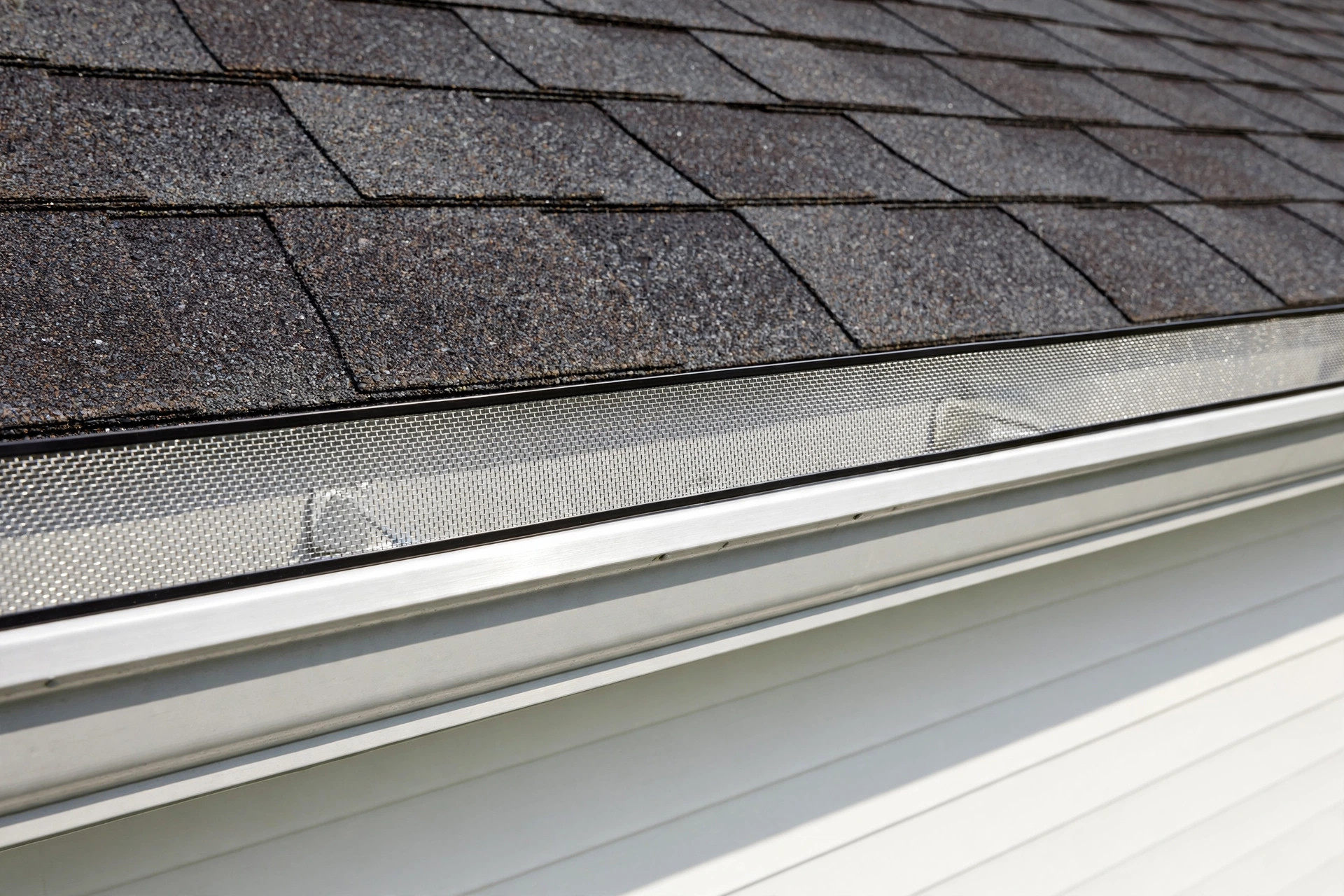 low maintenance seamless gutter guards buying guide: Low maintenance seamless gutter guards on an American home gutter