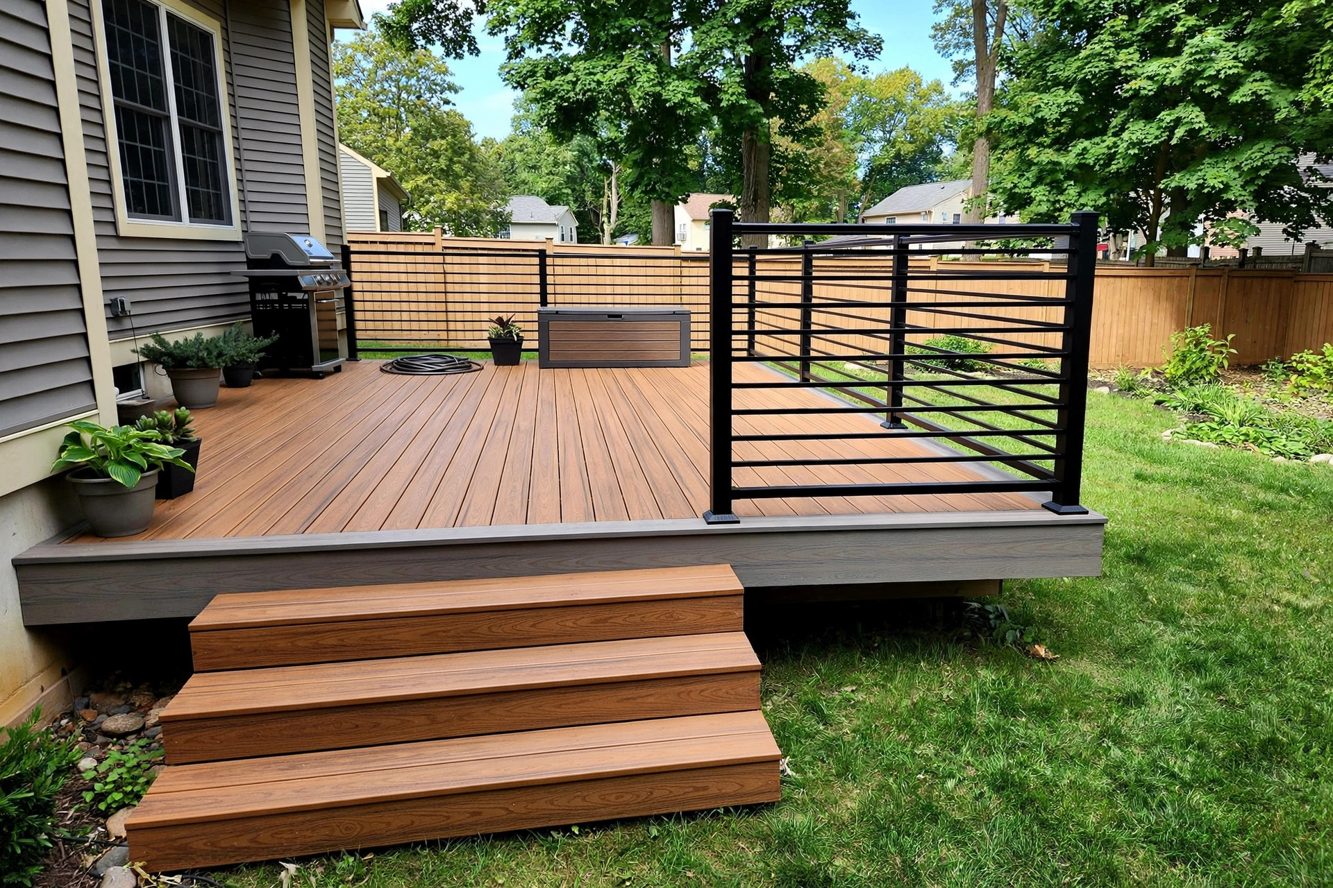 durable composite decking materials for sale installed on a new backyard deck