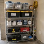 space saving heavy duty wire shelving buying guide: Wire shelving units holding boxes and supplies in a small garage