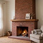 best chimney sweep services near me: A freshly swept brick fireplace and chimney in an American living room