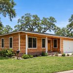 reliable wood siding replacement in texas: Wood siding replacement on a Texas ranch-style home
