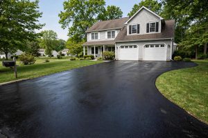 Asphalt Driveway Sealcoating Cost Near Me: What Homeowners Really Pay