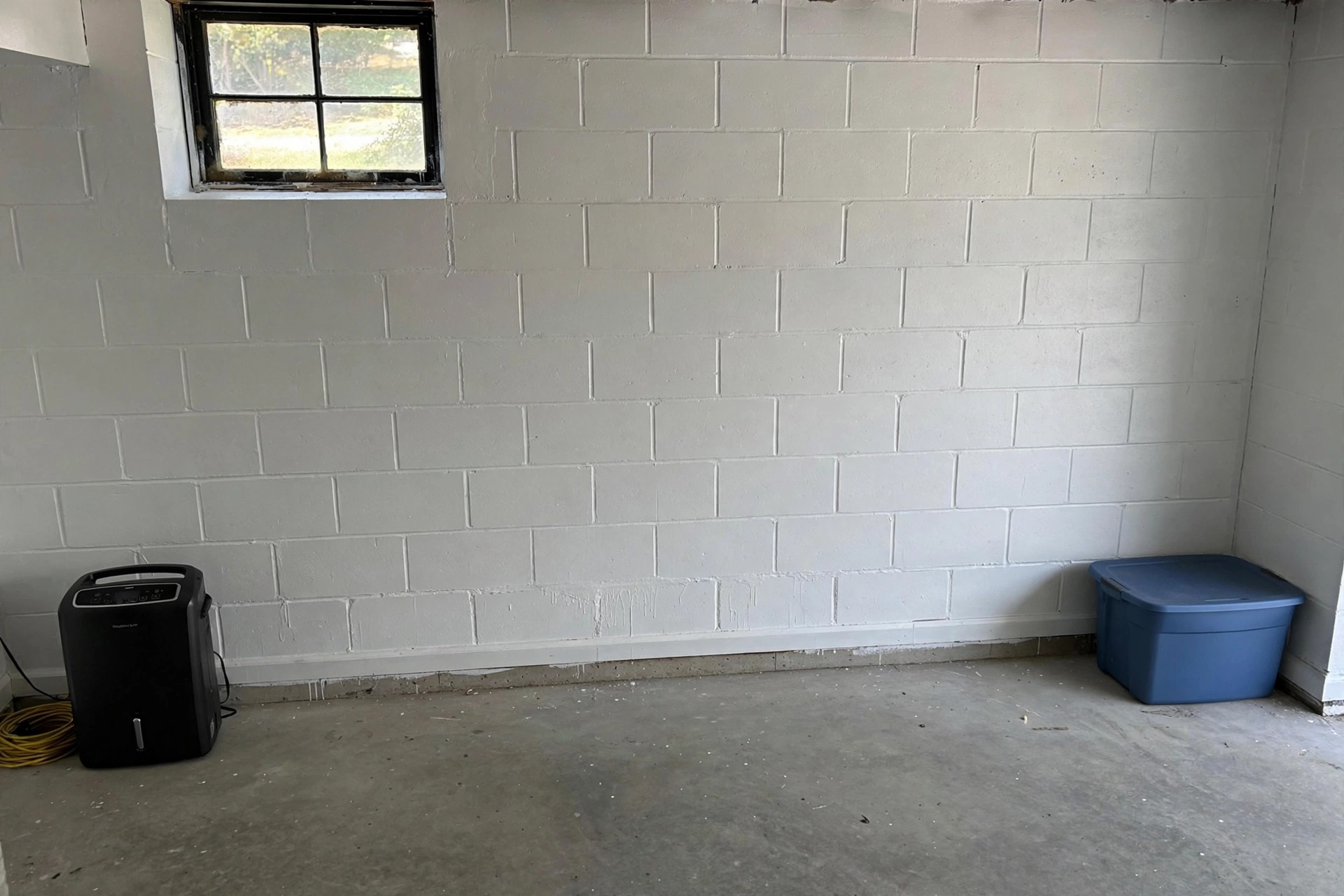 Drylok vs Behr basement paint comparison on a finished basement wall