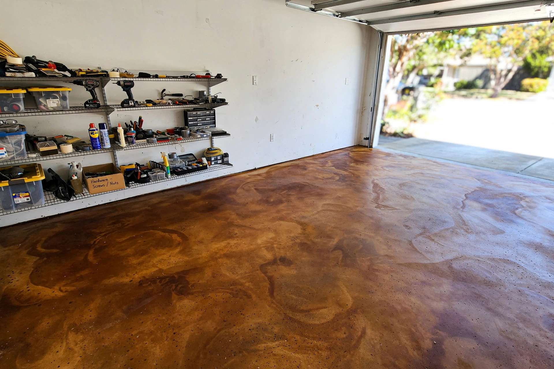 best concrete floor stain for garage usa: Stained concrete garage floor showing rich warm brown color