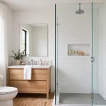 frameless shower doors deals near me: Frameless glass shower door in a modern American bathroom