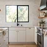 Mix Metal Finishes: kitchen with mixed brass and black metal hardware